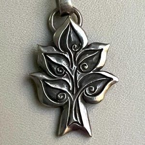 Jeep Collins Graceful Tree sterling silver pendant
15/16 " X 1 9/16"